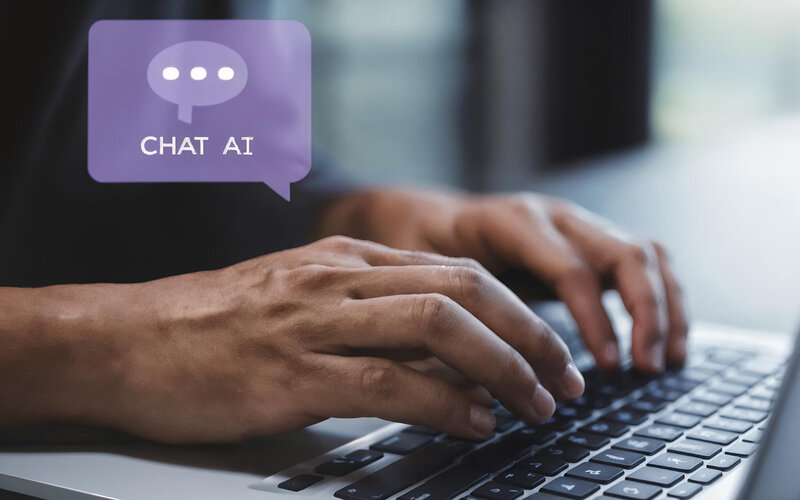 Chat AI typing on laptop representing questioning numbers